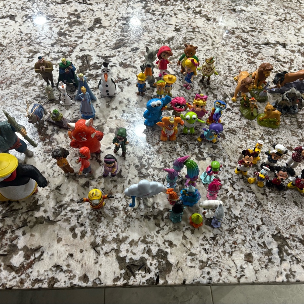 Lot of many gently used Disney Figurine Toy Sets